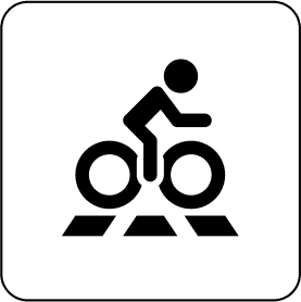 Bicicleta en movimiento en la ciudad, promoviendo el ciclismo urbano y la movilidad sostenible.